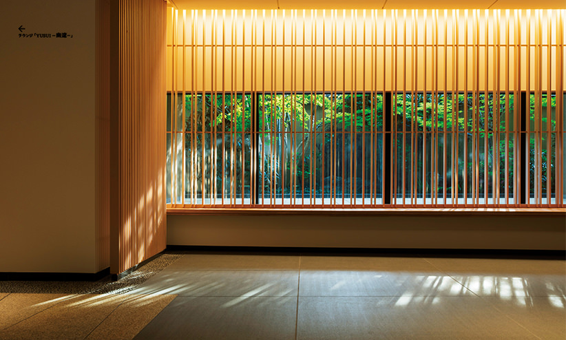 京都らしい木格子が効果的に映える、エントランスホール。