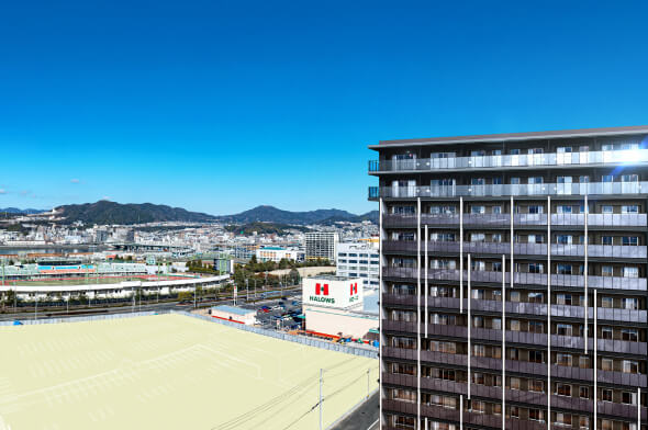 現地南東方向から望む外観完成予想CG